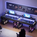 Black Gaming Desk with LED Lights and Power Outlets, 55 Inch Computer Desk with 3 Drawers and Adjustable Monitor Stand